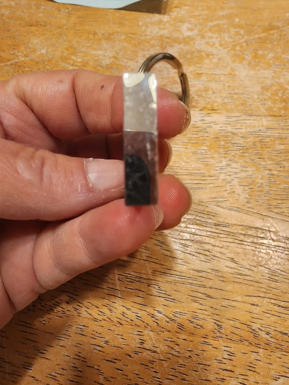 blue leather Fendi logo plaque keychain features silver-tone hardware